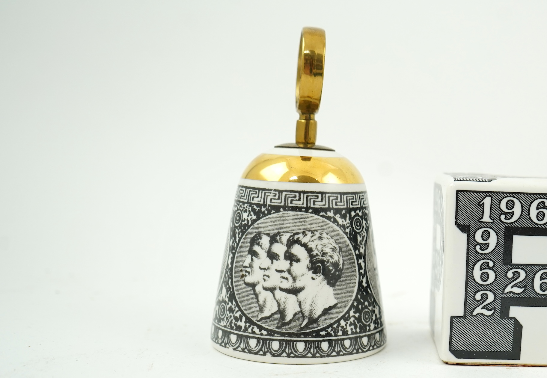Piero Fornasetti (Italian, 1913-1988): A collection of Fornasetti desk items and dishes